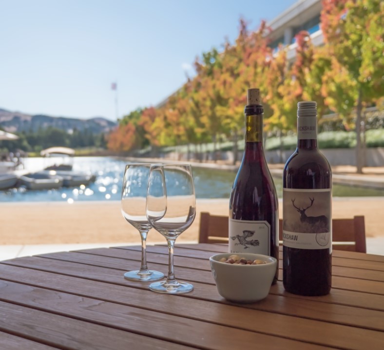 Drinking wine outside during the Happy Hour at Lakeside Cafe